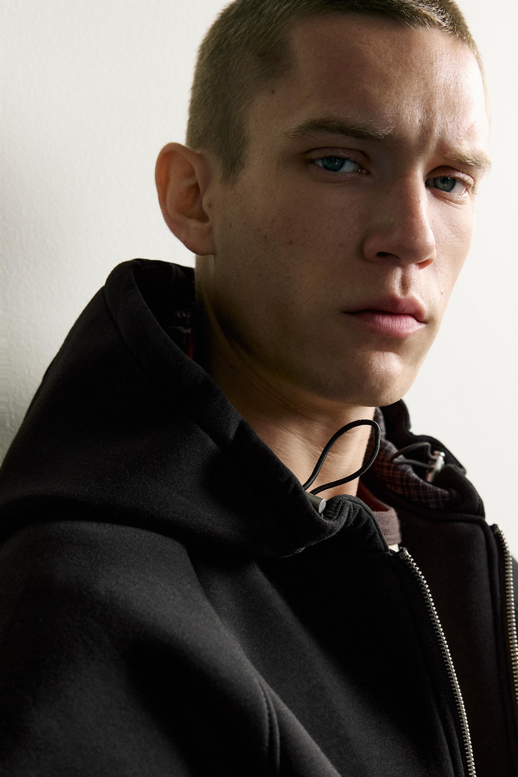 RELAXED-FIT TECHNICAL HOODED JACKET